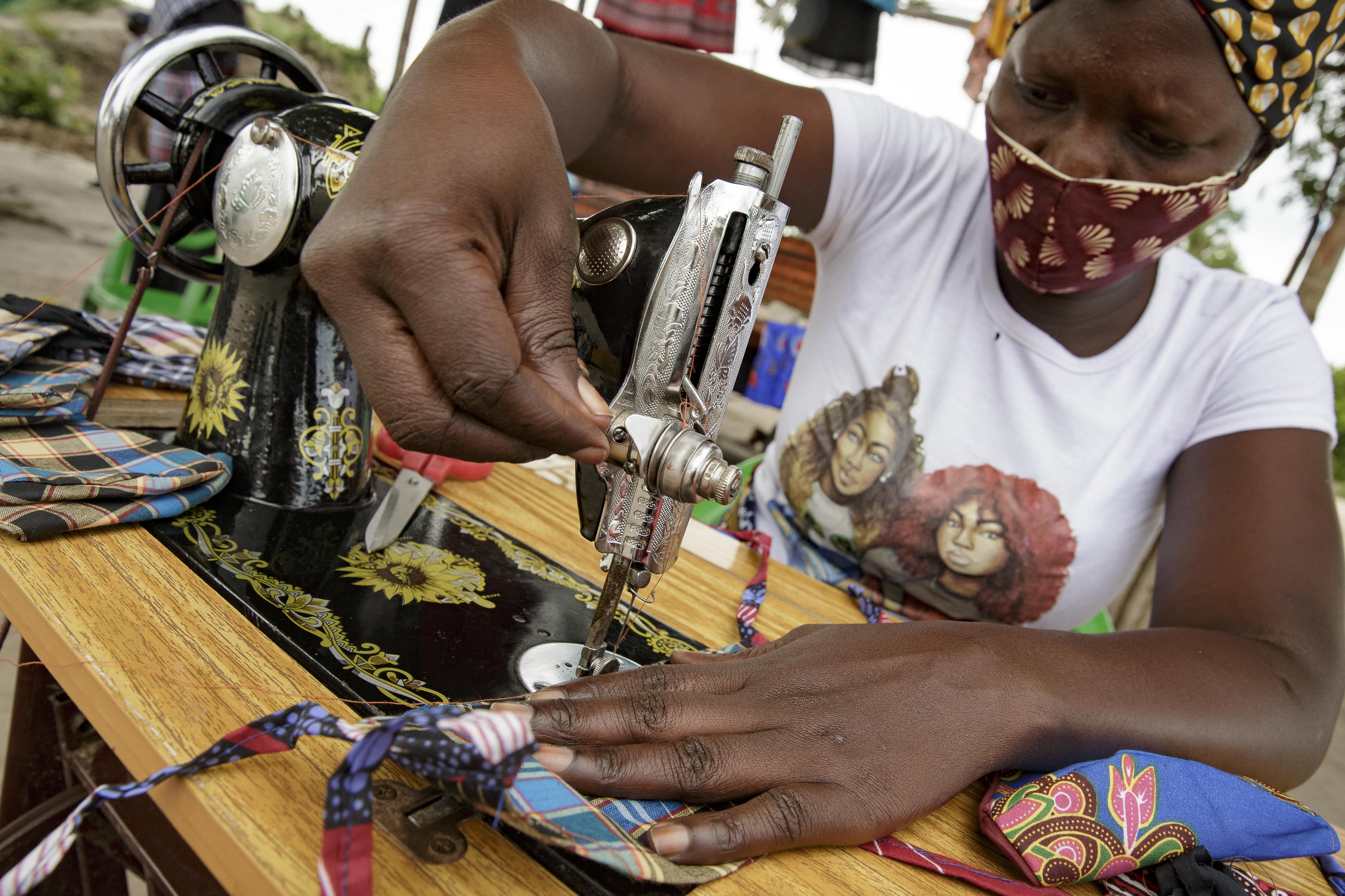 Cecilia Chata Valentim makes masks in Mandruzi, a resettlement area in Sofala province.