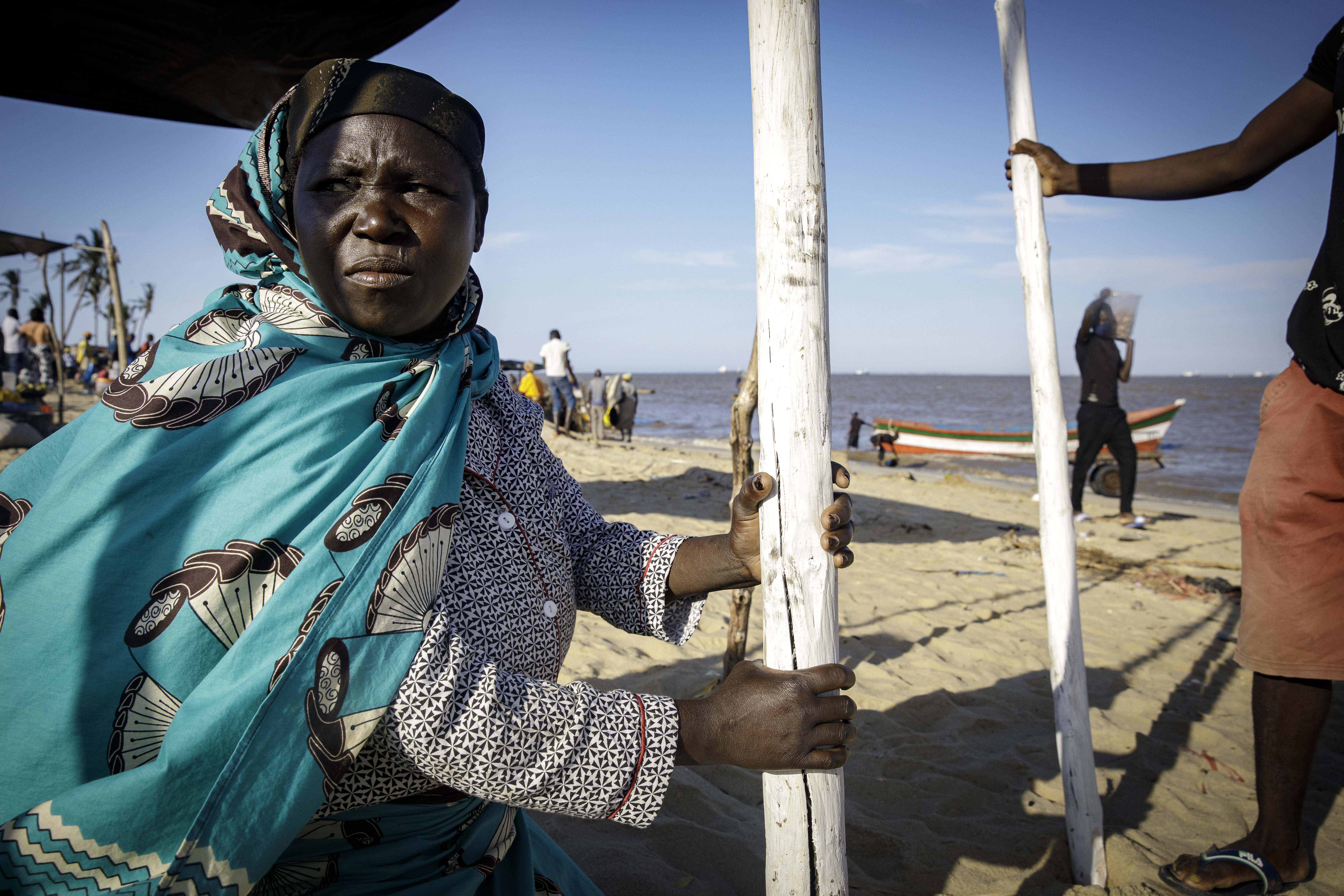 Fishermen and informal workers start their day in at Praia Nova in Beira, central Mozambique.