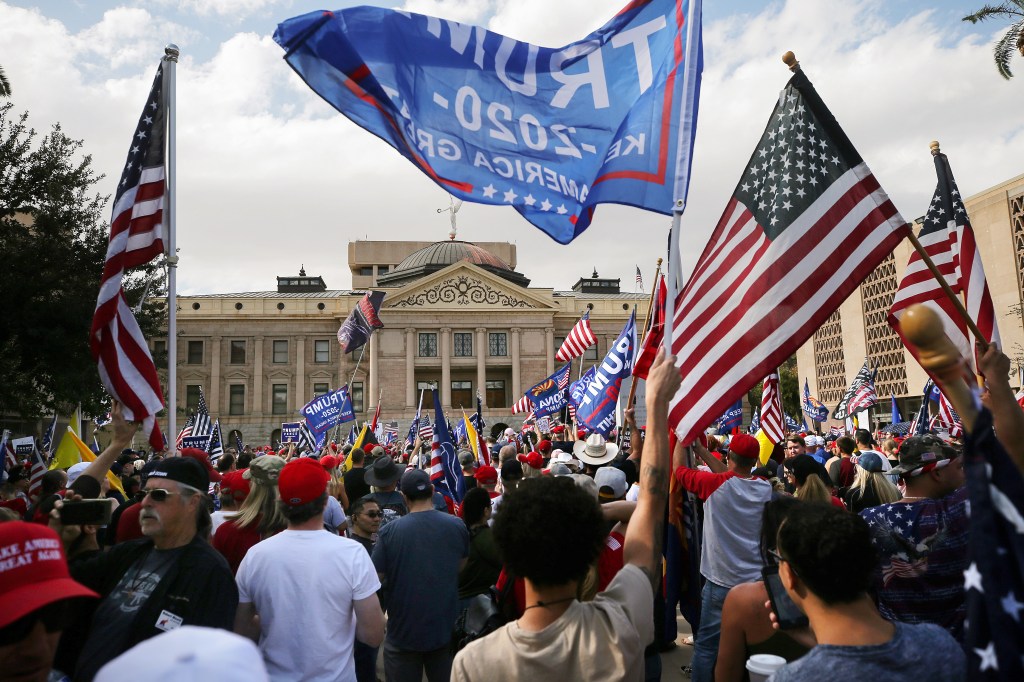 Supporters of President Donald Trump demonstrate at a ‘Stop the Steal’ rally in front of the State Capitol on November 7, 2020 in Phoenix, Arizona. (Mario Tama/Getty Images)​