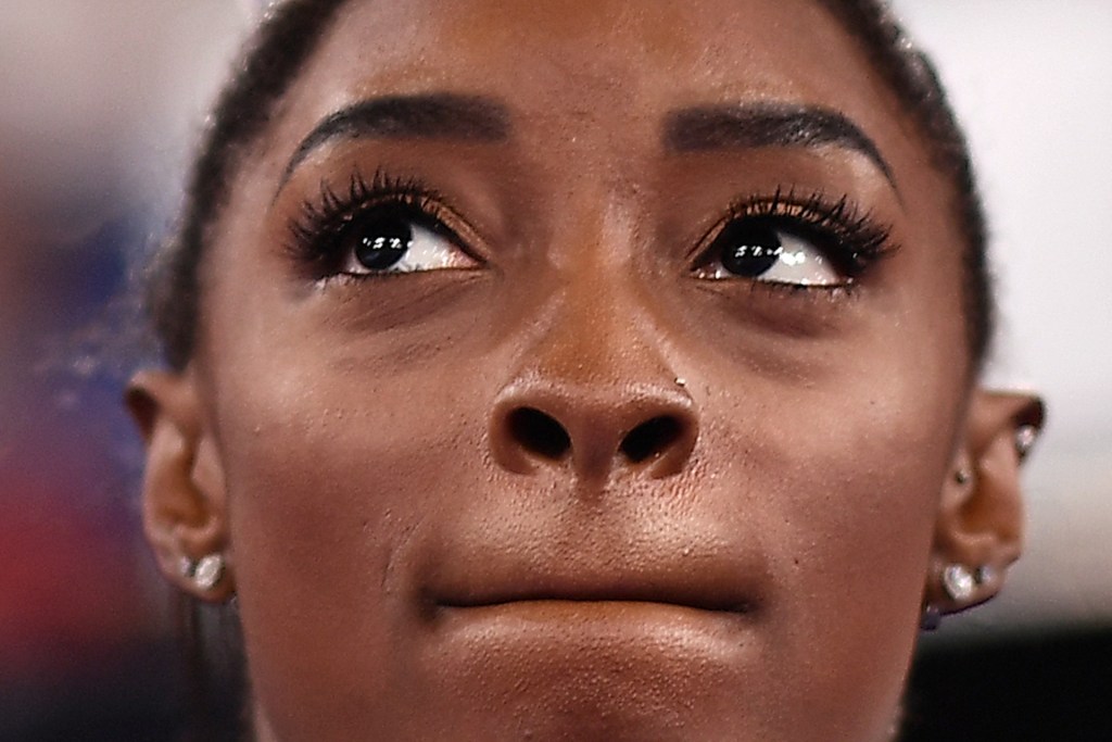 In this file photo taken on July 27, 2021 USA's Simone Biles reacts during the artistic gymnastics women's team final during the Tokyo 2020 Olympic Games at the Ariake Gymnastics Centre in Tokyo.