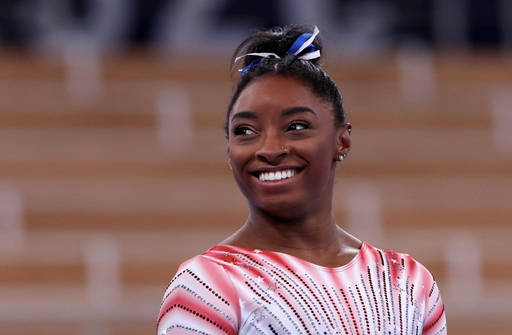 Simone Biles of Team United States reacts before the Women's Balance Beam Final at Ariake Gymnastics Centre on August 03, 2021 in Tokyo, Japan. (Photo by Xavier Laine/Getty Images)