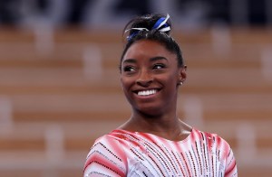 Simone Biles of Team United States reacts before the Women's Balance Beam Final at Ariake Gymnastics Centre on August 03, 2021 in Tokyo, Japan. (Photo by Xavier Laine/Getty Images)