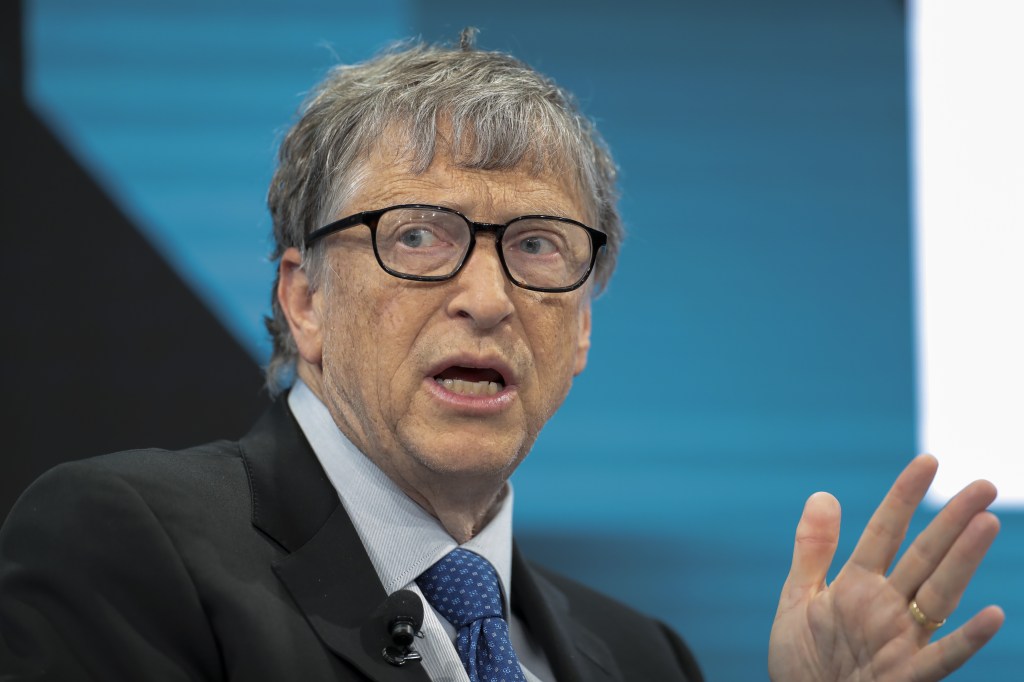 Bill Gates, billionaire and co-chair of the Bill and Melinda Gates Foundation, gestures as he speaks during a panel session on the opening day of the World Economic Forum (WEF) in Davos, Switzerland, on Tuesday, Jan. 22, 2019. (Jason Alden/Bloomberg via G