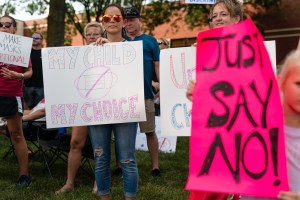 Demonstrators gather during a Gwinnett County Public Schools 'Unmask Our Children' protest in Suwanee, Georgia, U.S., on Friday, July 30, 2021. (Elijah Nouvelage/Bloomberg via Getty Images)​