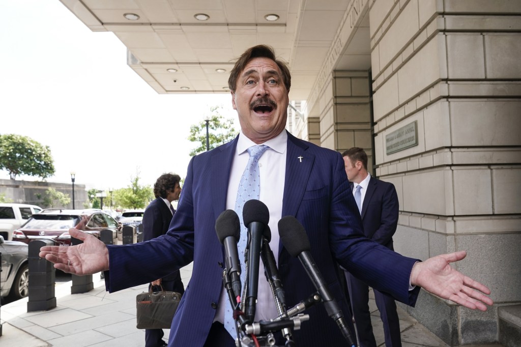 Mike Lindell, chief executive officer of My Pillow Inc., speaks to members of the media while arriving to federal court in Washington, D.C., U.S., on Thursday, June 24, 2021 (Joshua Roberts/Bloomberg via Getty Images​)