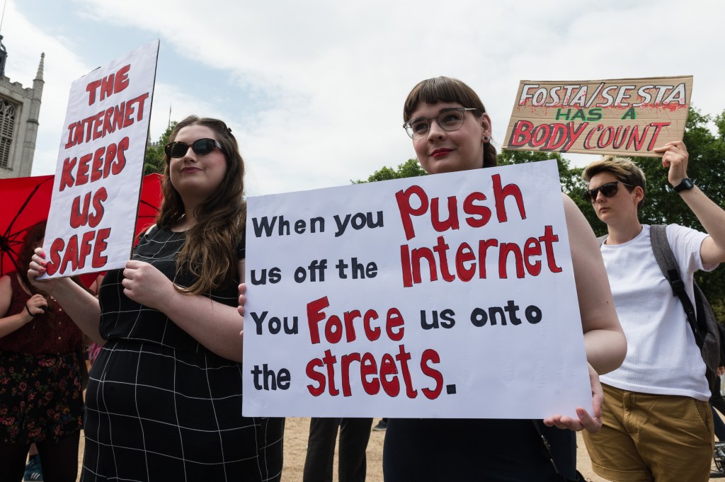 Sex workers and activists stage a protest against FOSTA/SESTA outside Parliament in London in 2018.