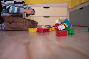 Child playing with lego