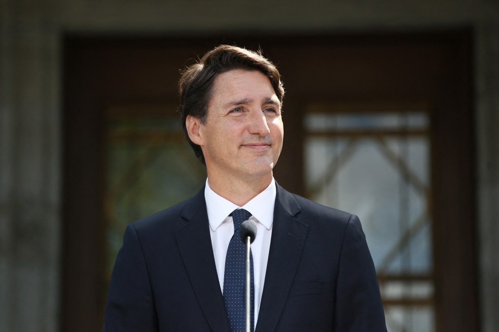 Canada's Prime Minister Justin Trudeau smiles after announcing snap elections for Sept. 20.