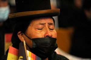 An Aymara woman, mother of a victim of state violence, listens to the final report of the Interdisciplinary Group of Independent Experts (GIEI), at Bolivia's Central Bank Auditorium in La Paz, on August 17, 2021.