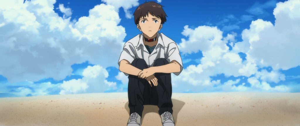 Shinji Ikari, sitting on a beach.