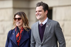 Rep. Matt Gaetz (R-FL) walks with his fiancee Ginger Luckey before speaking to a crowd during a rally against Rep. Liz Cheney (R-WY) on January 28, 2021 in Cheyenne, Wyoming. (Michael Ciaglo/Getty Images)​