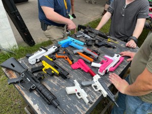 A collection of 3D-printed ghost guns at the first "Gun Maker's Match" shooting competition in Florida.