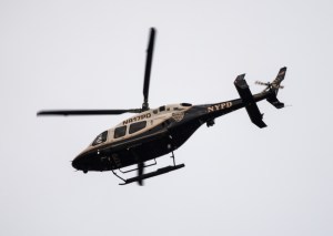 NYPD helicopter is seen above the 90th Annual Macy's Thanksgiving Day Parade on November 24, 2016 in New York City.