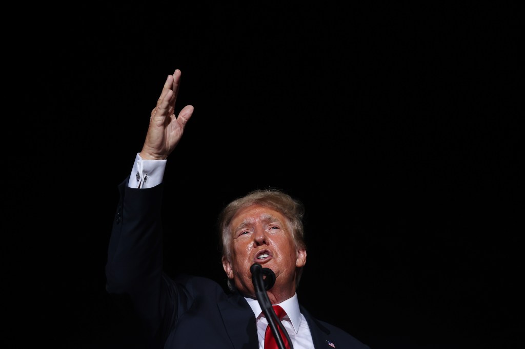 Former U.S. President Donald Trump addresses supporters during a rally on August 21, 2021 in Cullman, Alabama. ​