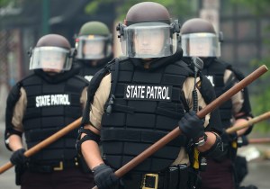 Police hold a line on the fourth day of protests on May 29, 2020 in Minneapolis, Minnesota