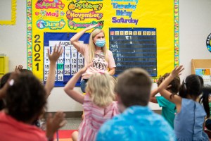 A teacher sings a song with her kindergarten class during the first day of class at Laguna Niguel Elementary School in Laguna Niguel, CA on Tuesday, August 17, 2021. (Paul Bersebach, MediaNews Group/Orange County Register via Getty Images)​