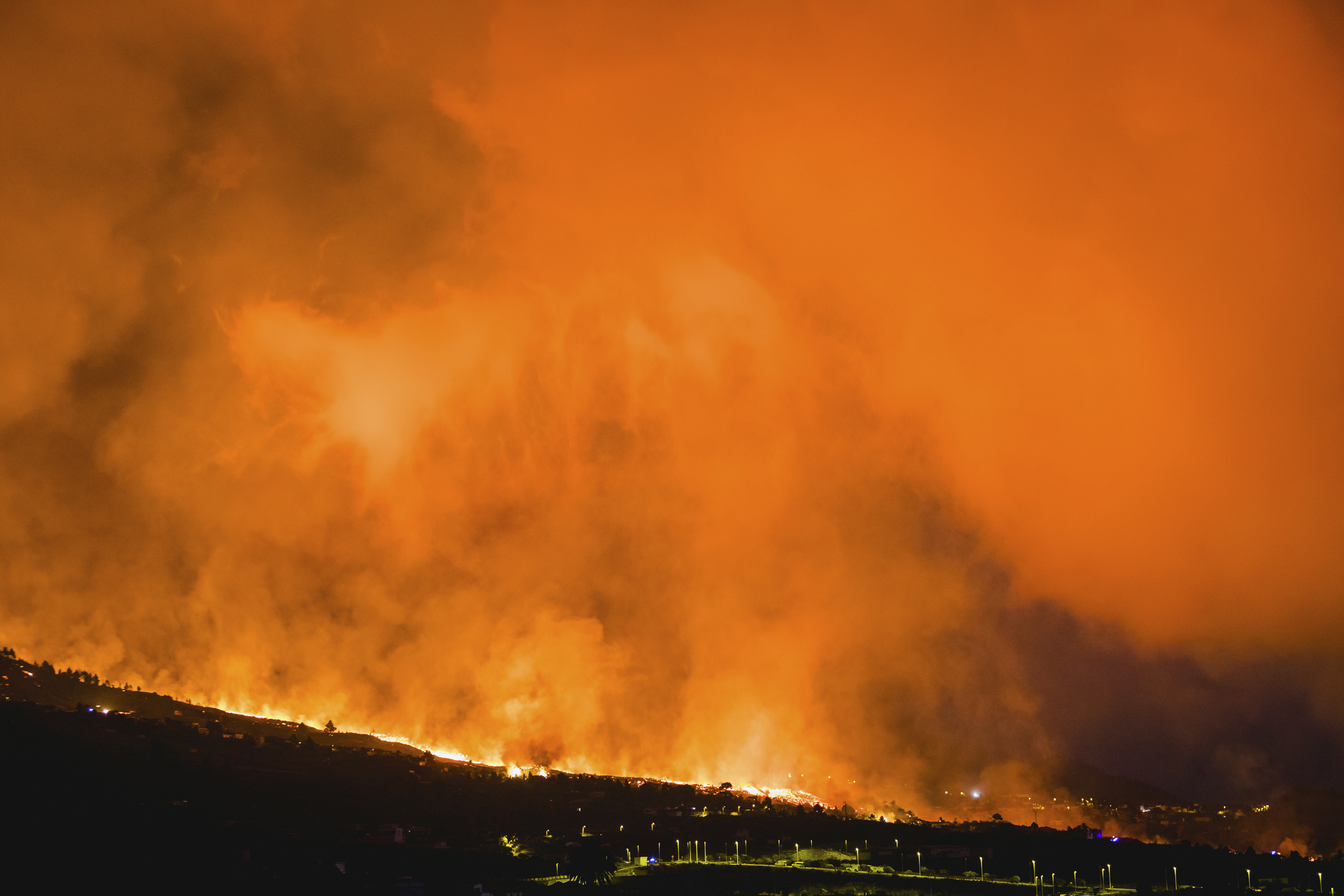 Lava flows from an eruption of a volcano near El Paso on the island of La Palma.