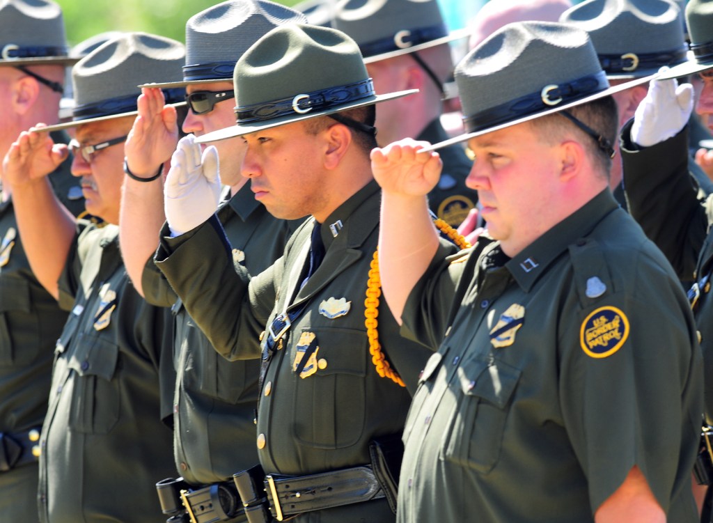 Yuma Sector Boarder Patrol agents salute on May 20, 2011 in Yuma, Arizona.