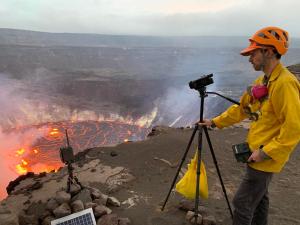 A USGS Hawaiian Volcano Observatory geologist takes video of the eruption that started within Halema'uma'u crater, Kīlauea summit, at about 3:20 p.m. on September 29, 2021. Scientists continue to monitor the eruption and hazards from within an area of Haw