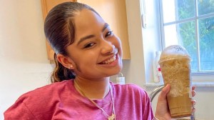 Miya Marcano holding iced coffee