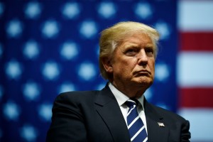 Then President-elect Donald Trump looks on during a rally on December 9, 2016 in Grand Rapids, Michigan.​