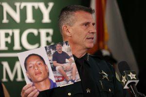 In this file photo, Sheriff John W. Mina shows photos of Armando Manuel Caballero during a press conference on the case of missing 19-year-old Miya Marcano at the Orange County Sheriffâs Office Central Operations, on Sept. 27, 2021.