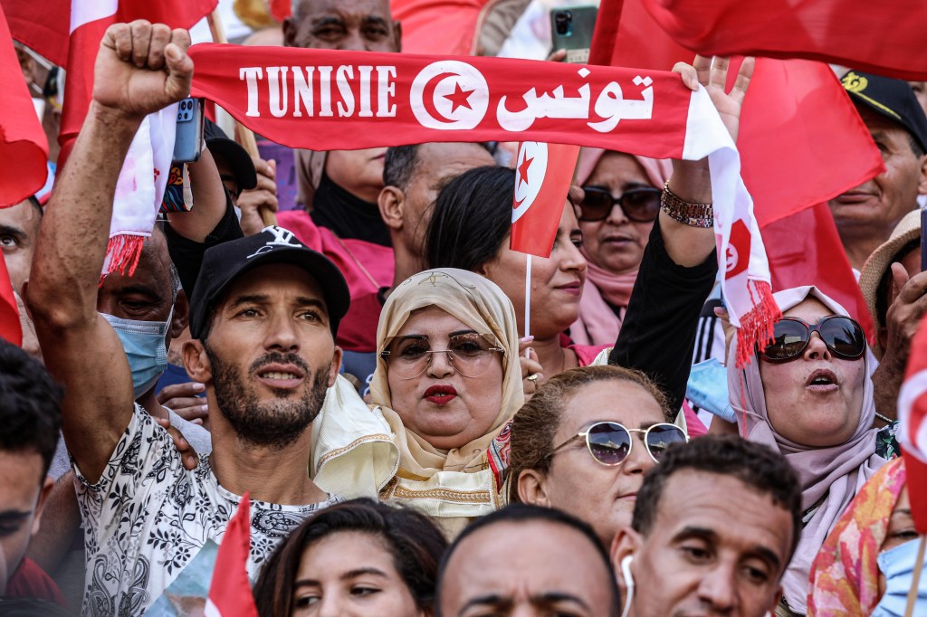 People take part in a protest supporting Tunisian President Kais Saied, after he suspended parliament and assumed executive authority in July 2021​.