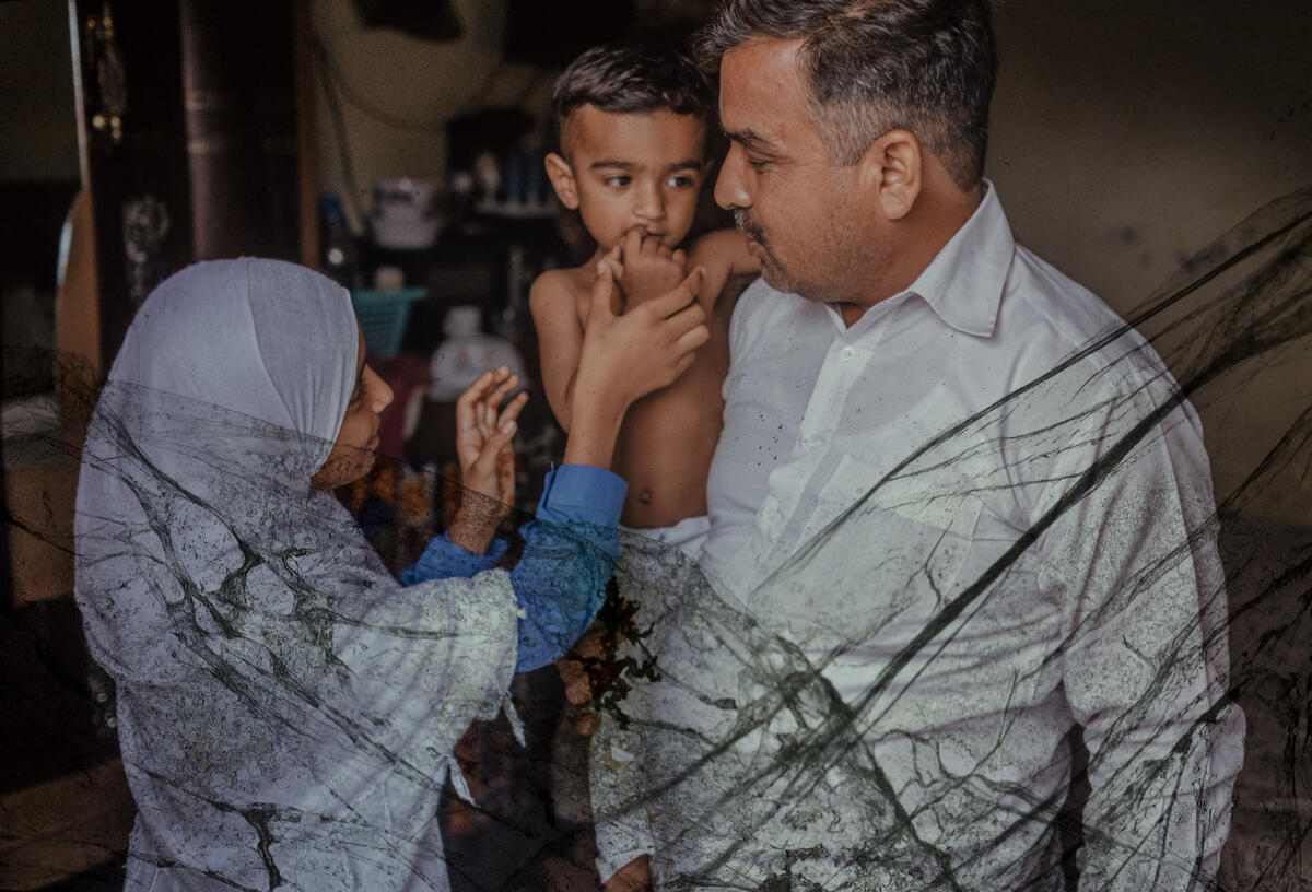 Zahra, 12, at home with her father and younger brother in Lahore, Pakistan. 