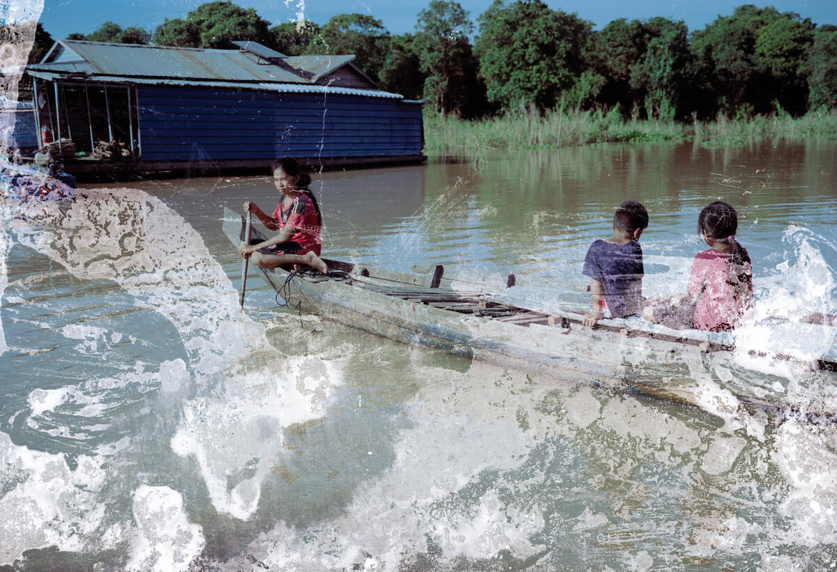 Kimsorn taking her boat to collect some work from her neighbour on Tonlé Sap Lake, Kompong Thom province, Cambodia. Image: Lim Sokchanlina / Save the Children 