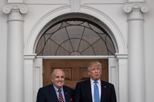 Former New York City mayor Rudy Giuliani stands with president-elect Donald Trump before their meeting at Trump International Golf Club, November 20, 2016 in Bedminster Township, New Jersey. (Drew Angerer/Getty Images)