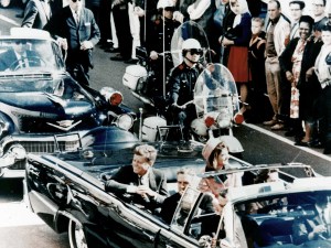 President John F. Kennedy in the presidential limousine before his assassination. His wife Jacqueline is next to him and Texas Governor John Connally and his wife Nellie sit in front. (Photo 12/Universal Images Group via Getty Images)​