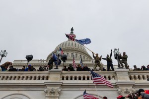 Demonstrators attempt to enter the U.S. Capitol building during a protest in Washington, D.C., U.S., on Wednesday, Jan. 6, 2021. (Eric Lee/Bloomberg via Getty Images)​