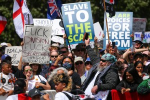 Protesters gather during a Freedom and Rights Coalition protest at Parliament on November 09, 2021 in Wellington, New Zealand. Protesters gathered outside parliament calling for an end to Covid restrictions and vaccine mandates in New Zealand. (Hagen Hopk