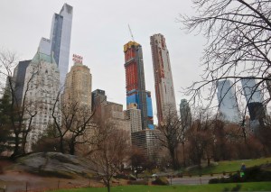 Residential skyscrapers, including One57, second from left, a gleaming 75-story glass high-rise on West 57th, make up a Manhattan neighborhood of sprouting luxury towers dubbed "Billionaires' Row," Wednesday April 4, 2018, in New York.