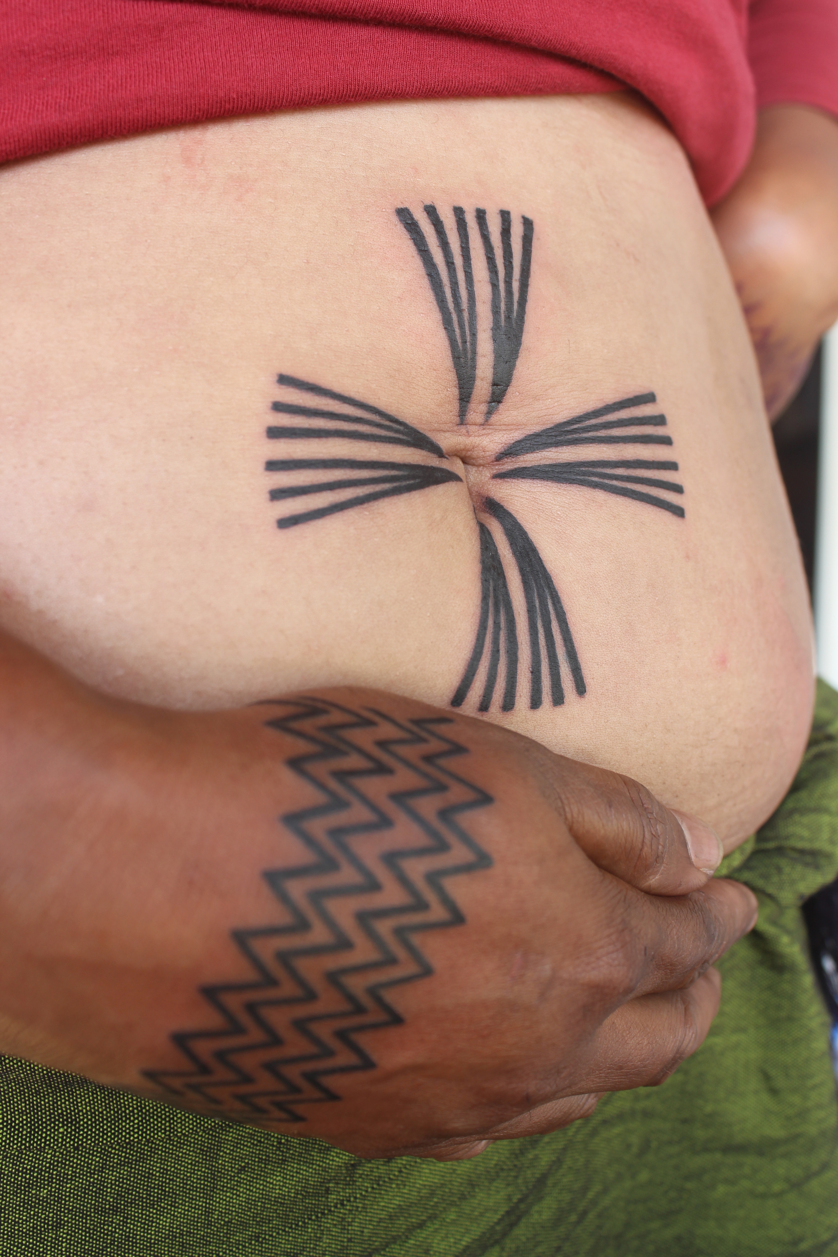 Traditional Konyak tattoo on a Konyak lady.JPG