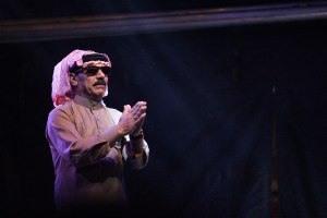 1599px-Omar_Souleyman_at_WOMAD_Cáceres_2018_(claps)