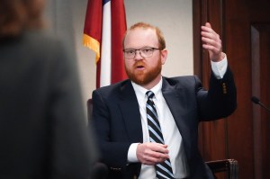 travis mcmichael on the stand at ahmaud arbery trial