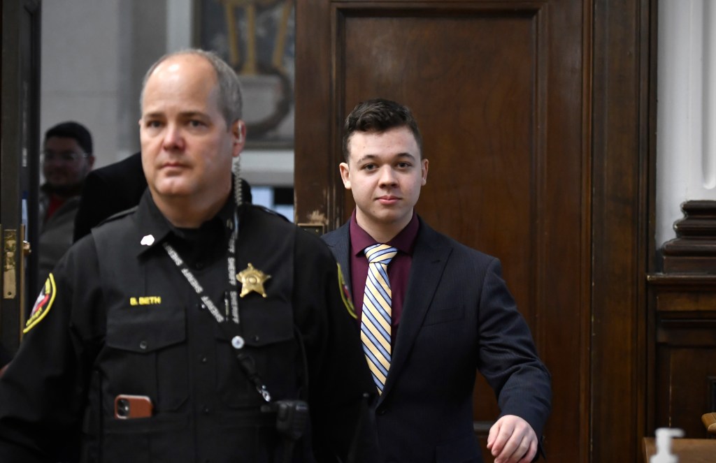 Kyle Rittenhouse walks back into the courtroom after a break during his trial at the Kenosha County Courthouse on November 11, 2021 in Kenosha, Wisconsin. (Sean Krajacic-Pool/Getty Images)​