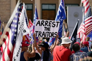 Supporters of President Donald Trump rally outside the Arizona state capitol Saturday, Nov. 7, 2020, in Phoenix. (AP Photo/Ross D. Franklin)​