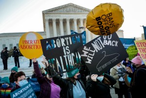 Protesters gather in front of the U.S. Supreme Court as the justices hear arguments in Dobbs v. Jackson Women's Health, a case about a Mississippi law that bans most abortions after 15 weeks, on December 01, 2021 in Washington, D.C.