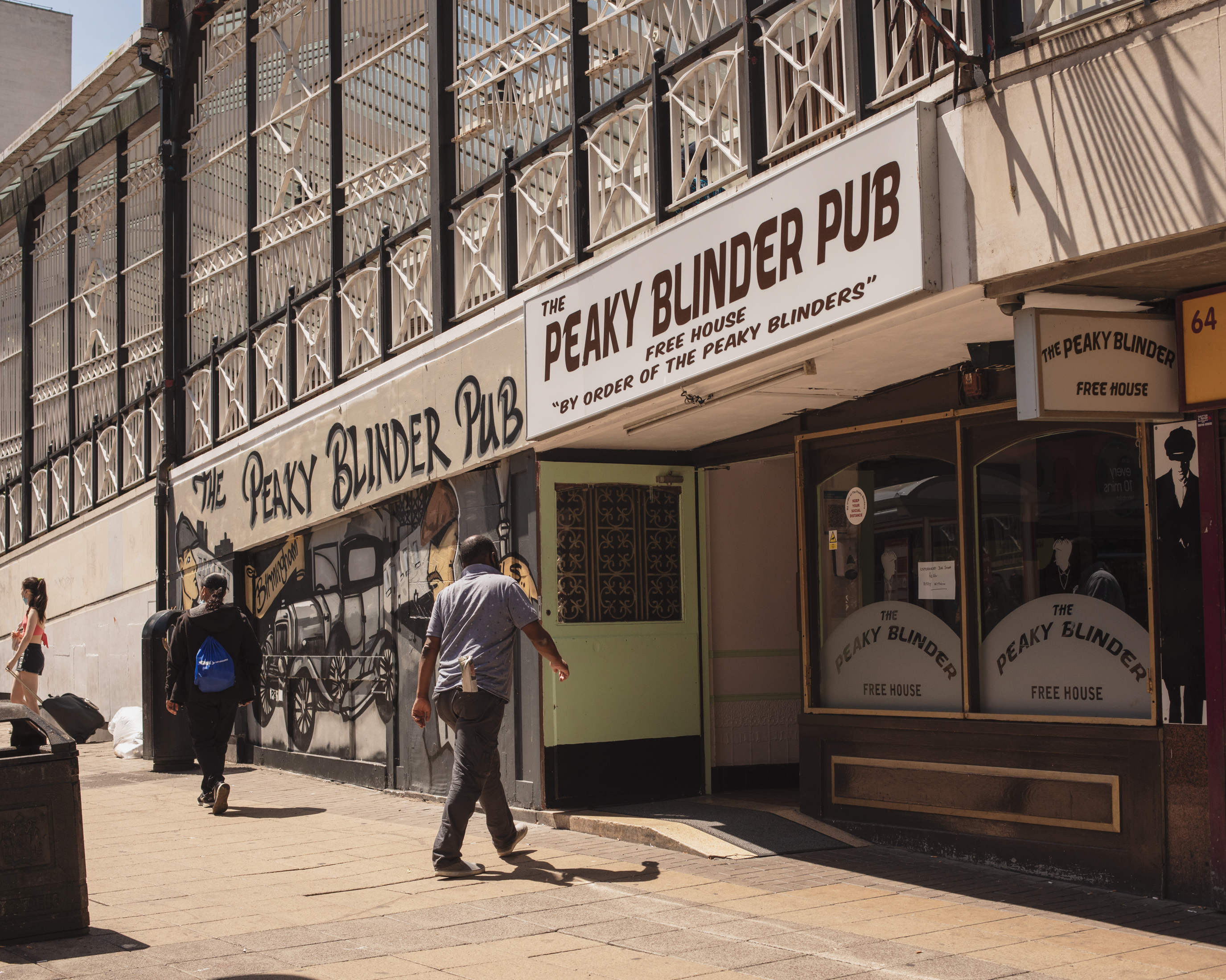 A man walks into the Peaky Blinder Pub in Birmingham