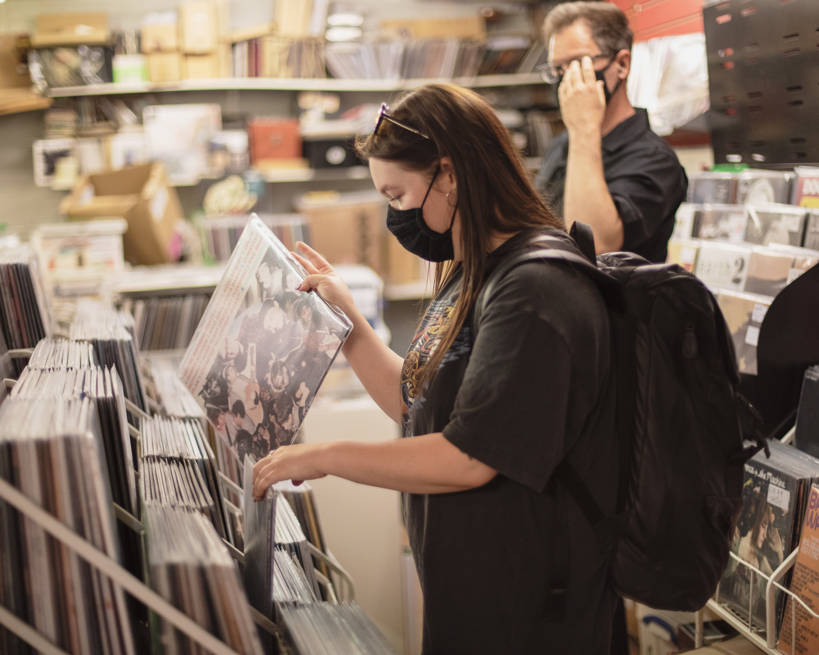 VICE writer Lauren O'Neill in Birmingham looking through records at a music shop