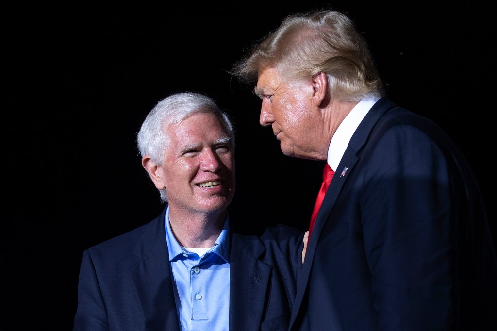 Former U.S. President Donald Trump (R) welcomes candidate for U.S. Senate and U.S. Rep. Mo Brooks (R-AL) during a "Save America" rally on August 21, 2021 in Cullman, Alabama.​