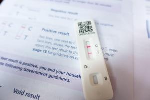 Coronavirus lateral flow test showing a positive result