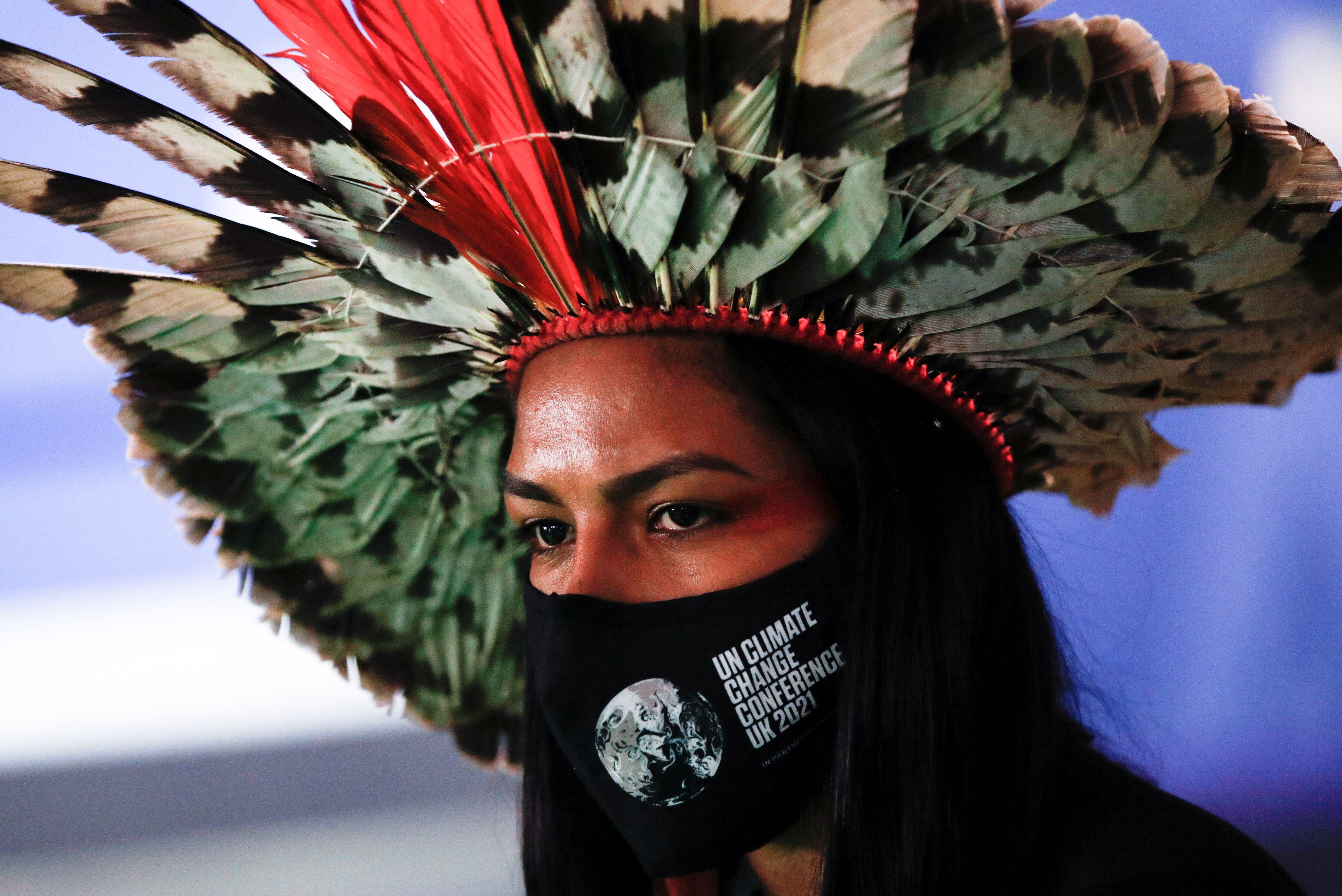 An indigenous Amazon delegate looks on during the UN Climate Change Conference