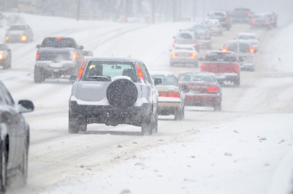 A stock image of cars in snow.