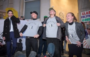 Four protesters celebrate after receiving a not guilty verdict at Bristol Crown Court. Photo: Finnbarr Webster/Getty Images​