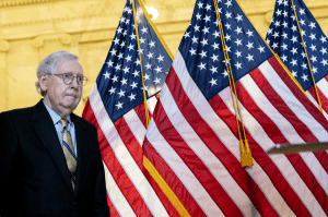 Senate Minority Leader Mitch McConnell, a Republican from Kentucky, walks at the Russell Senate Office building in Washington, D.C., U.S., on Tuesday, Jan. 4, 2022.