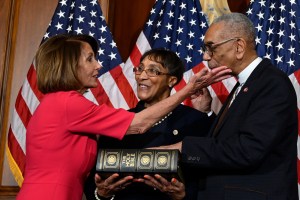 House Speaker Nancy Pelosi of Calif., left, talks with Rep. Bobby Rush, D-Ill., right, during a ceremonial swearing-in on Capitol Hill in Washington, Thursday, Jan. 3, 2019.