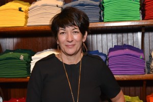 Ghislaine Maxwell stands in front of Ralph Lauren clothing